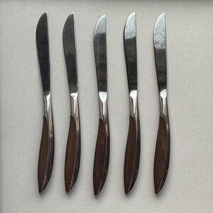 5 Stainless Steel Mid Century Modern SteakKnives w/ brown handles.  Marked Japan